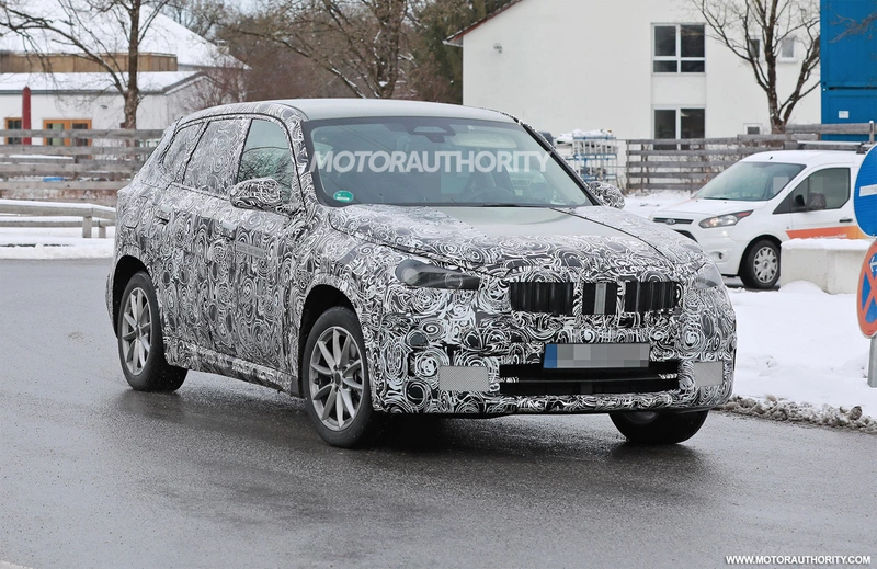 Spy shots of the 2023 BMW iX1: electric vehicle option for the updated X1 crossover SUV.